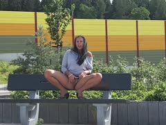 German Xara Wet wanks on a park bench